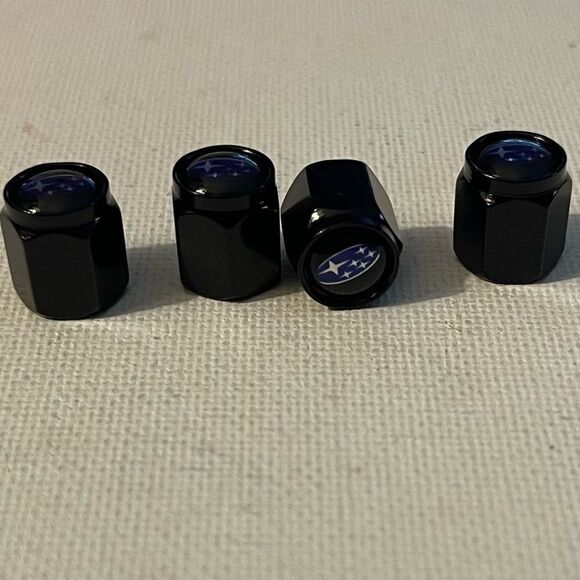 Subaru logo valve Stem caps in black set of 4 NWT - Picture 2 of 4
